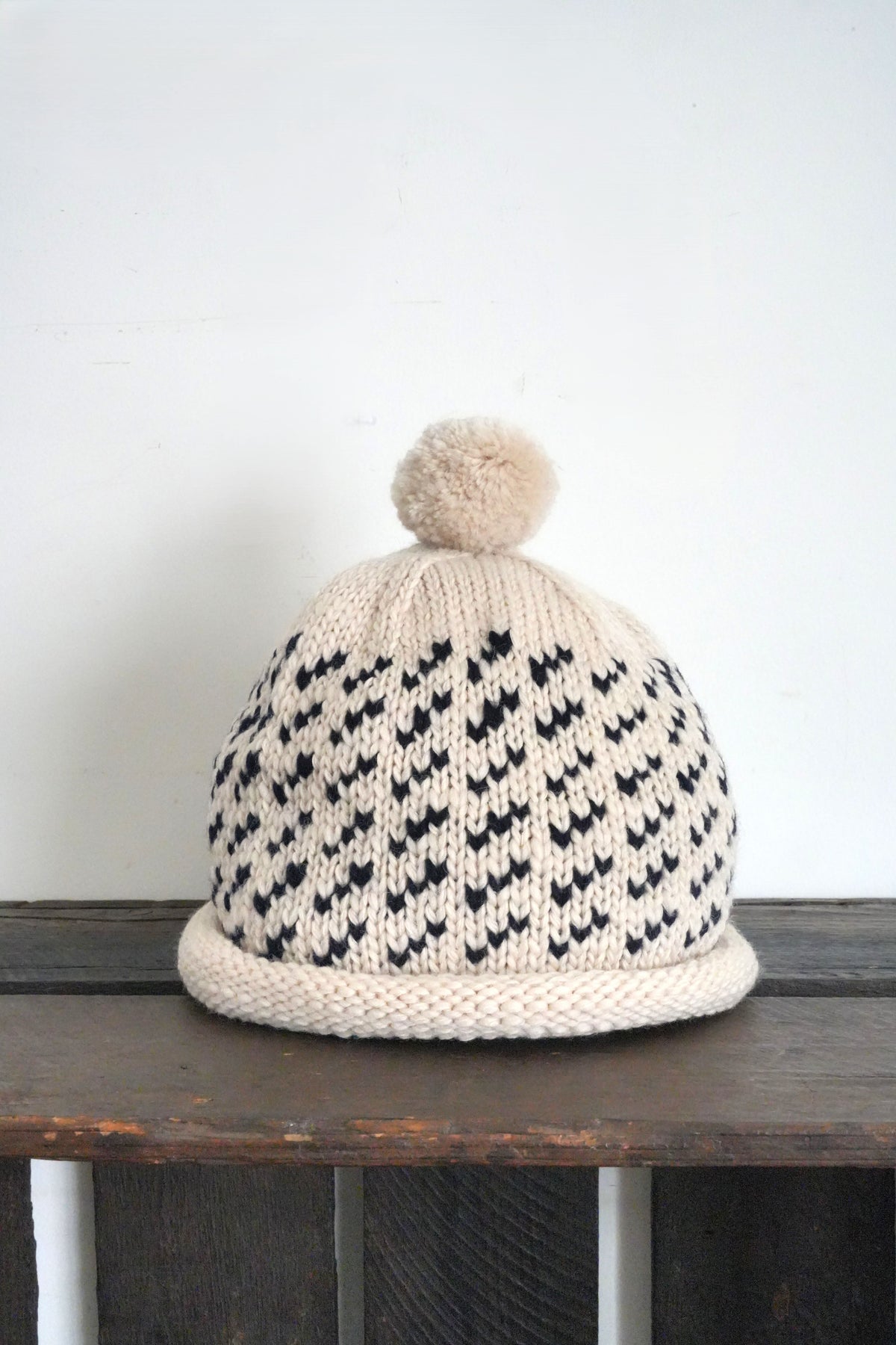 「cableami」wool jacquard w/cap with POM -ivory-