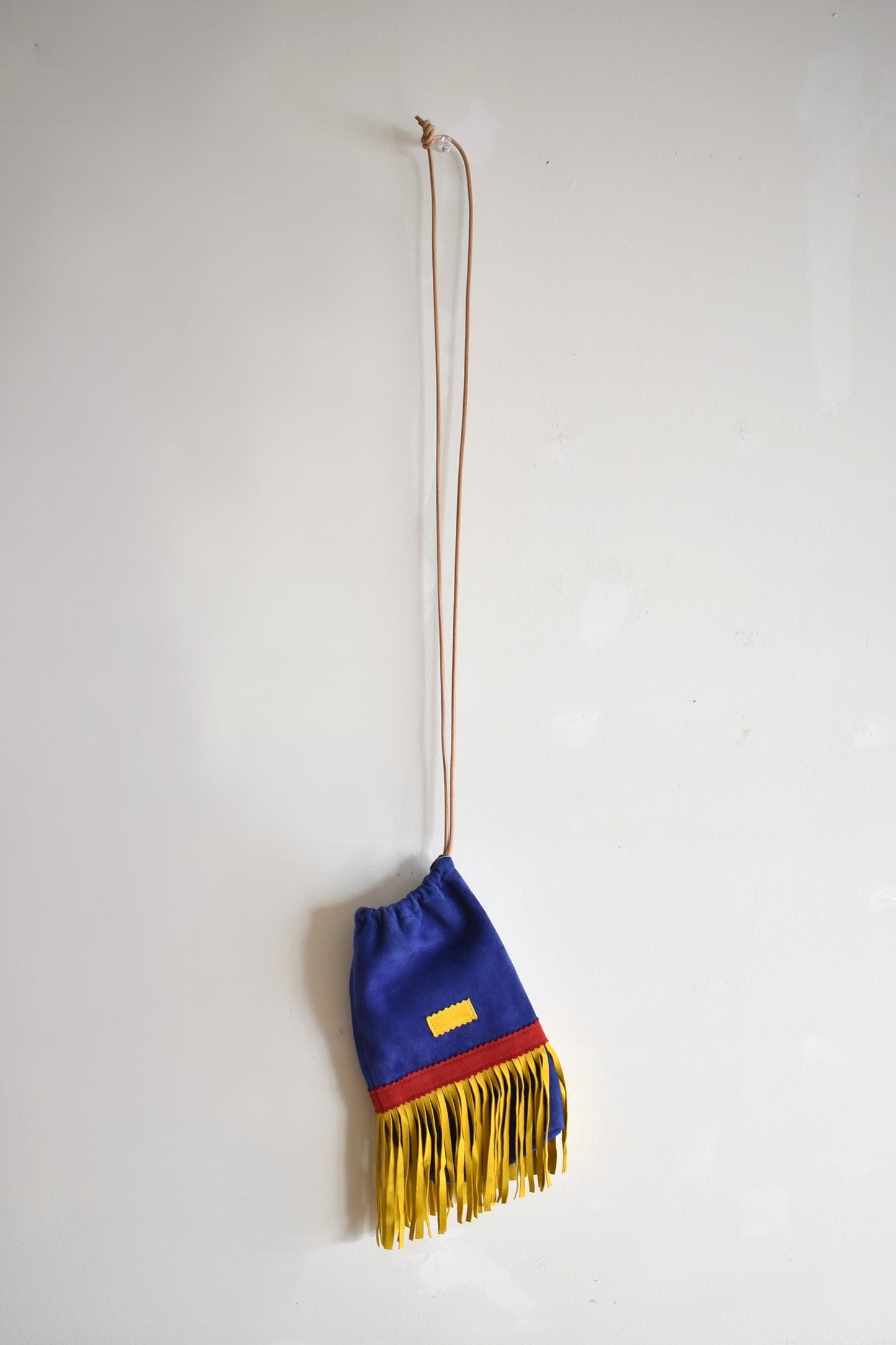 「1/2 HALF」suede fringe purse -blue mix-