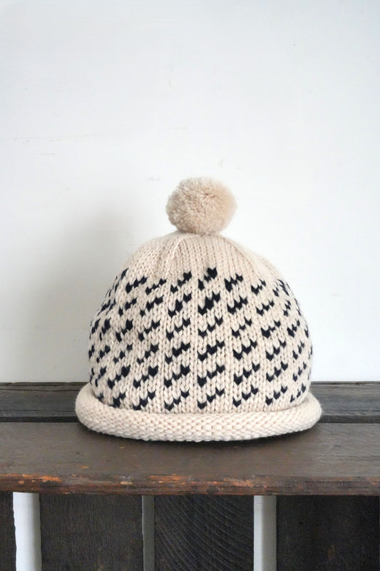 「cableami」wool jacquard w/cap with POM -ivory-