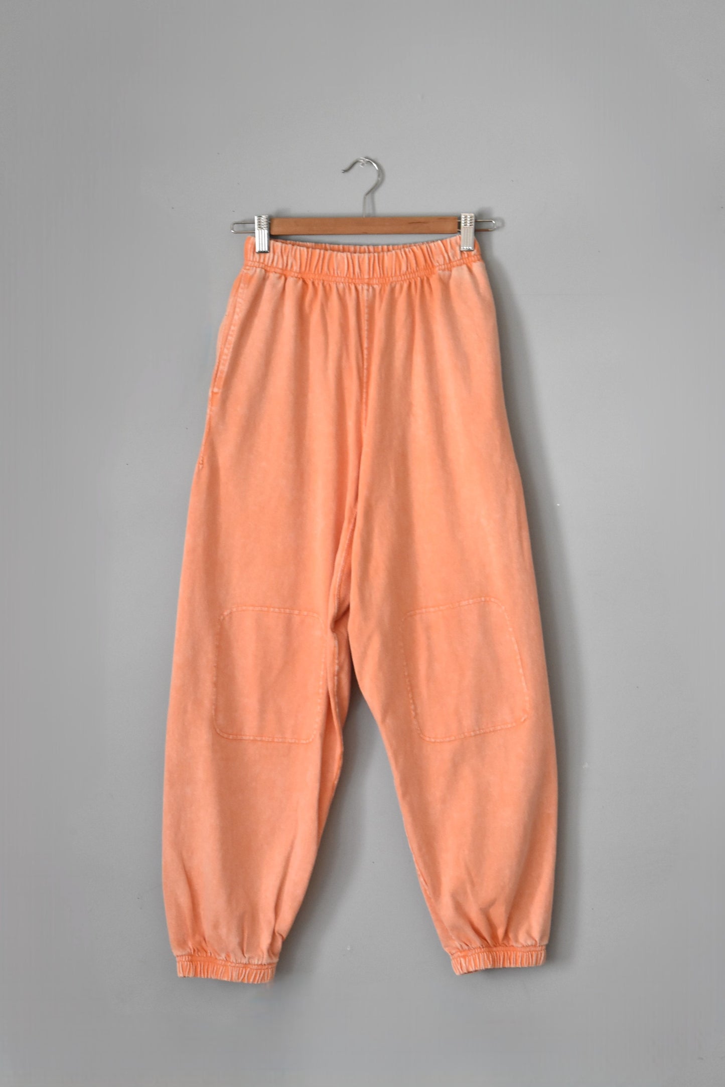 「imprestore」training pants -faded orange-