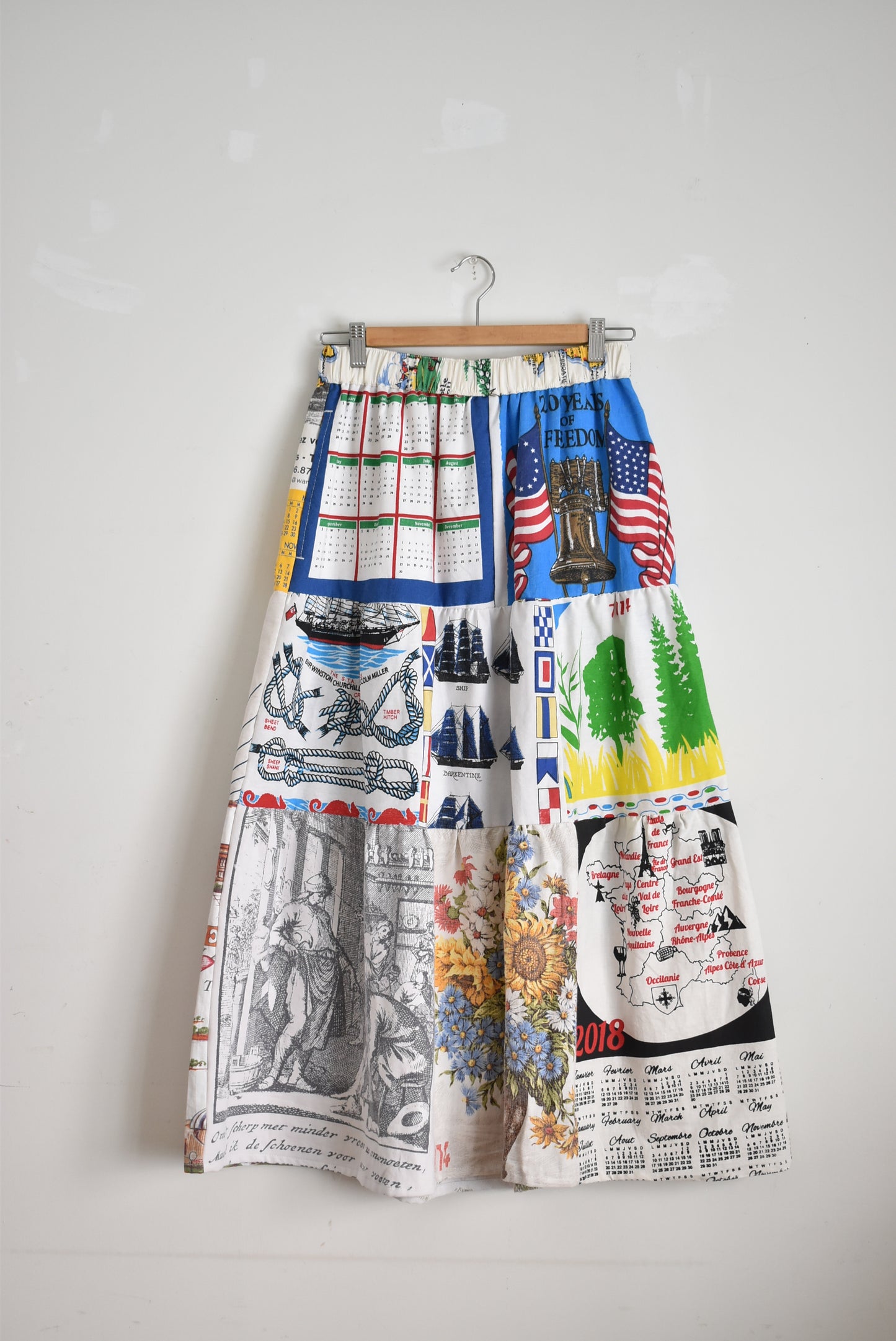 「nasugwam」tapestry tired skirt