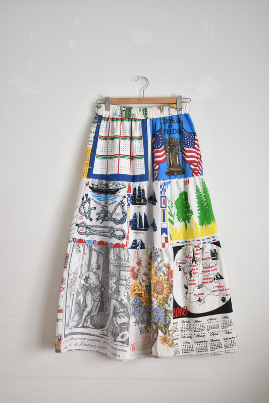 「nasugwam」tapestry tired skirt