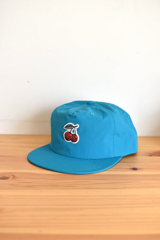 「Outliers Golf」cherrie nylon cap -tarquoise-