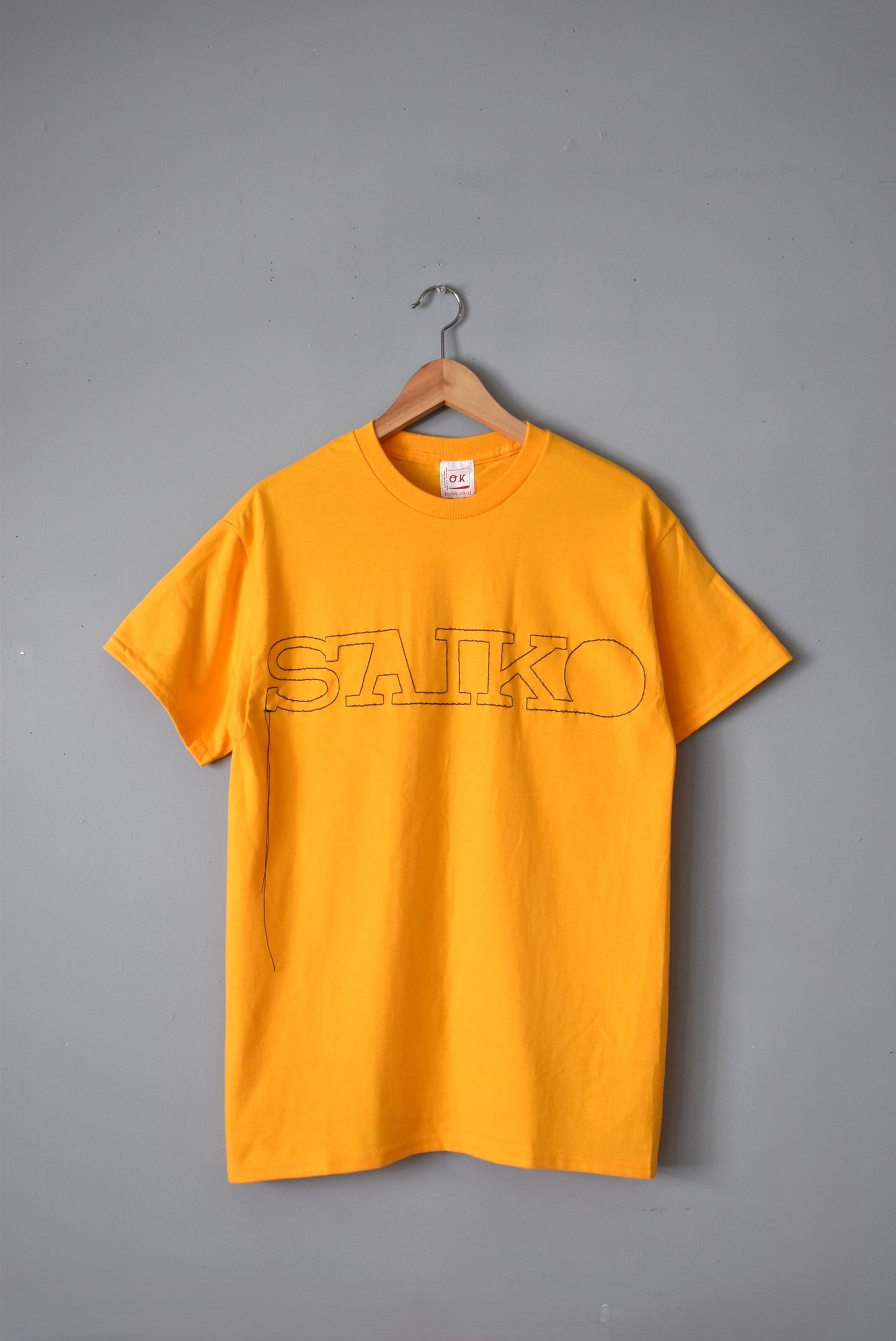 「O.K.」SAIKO stitch Tee -yellow-